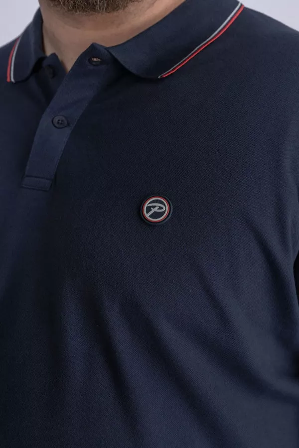 Polo uni en coton stretch avec badge poitrine Petrol